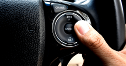 A driver's thumb on cruise control